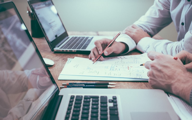 Distribution agreements being reviewed at a desk